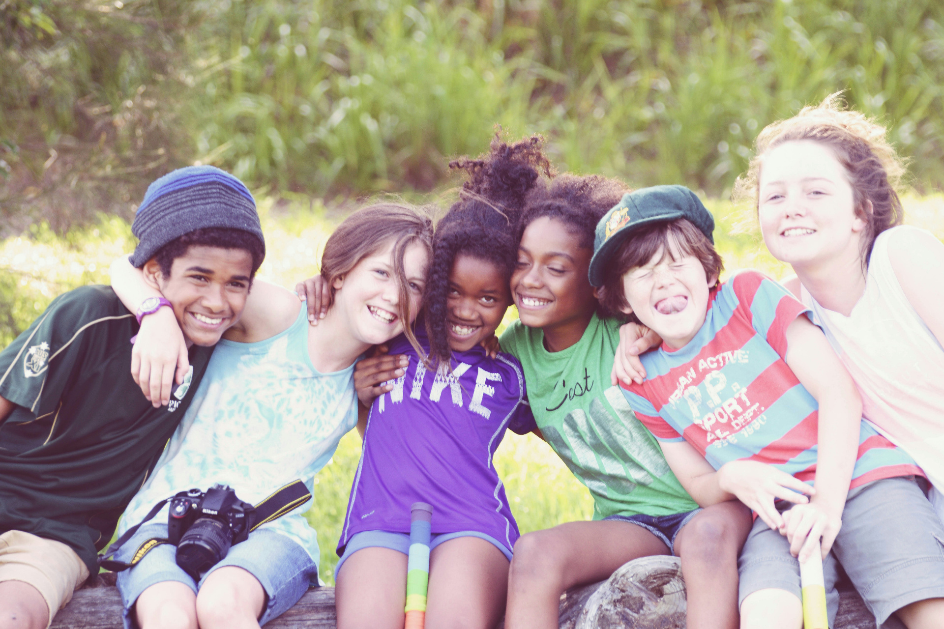 Children practicing social skills together in a small group class
